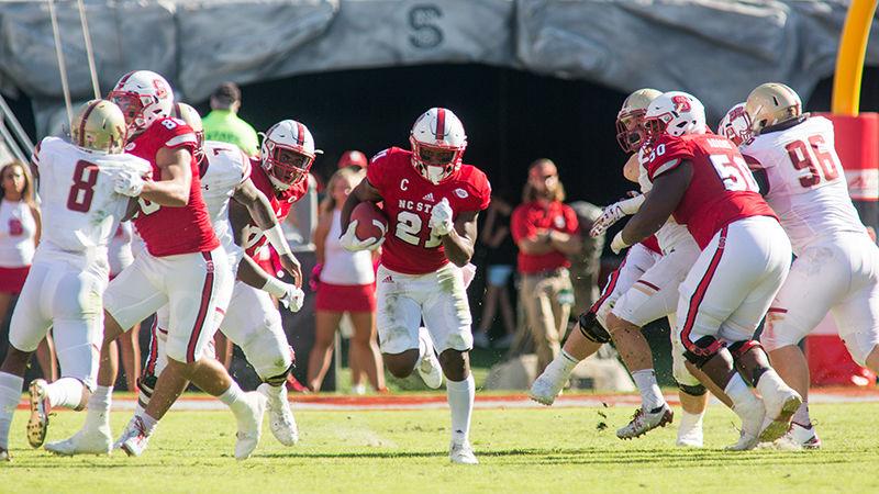 Senior running back Matt Dayes finally gets a hole from the offensive line and breaks off a 24-yard rush, his longest of the day. Dayes was held fast to 45 yards of rushing on 19 attempts but also had 33 yards through the air during the 21-14 homecoming loss to Boston College on Oct. 29 in Carter-Finley Stadium.