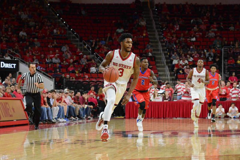 Redshirt senior guard Terry Henderson sprints down the court on a breakaway against St. Francis Brooklyn College on Nov. 13, 2016 in PNC Arena. Henderson put up stats in nearly every category, recording 11 points, five rebounds, three assists, and two steals in his 35 minutes of gametime during NCSU's 86-61 win.