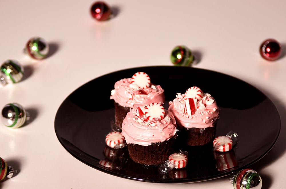 Chocolate cupcakes with peppermint buttercream make for a tasty holiday treat. Top them with crushed candy canes for a festive finish.&#160;