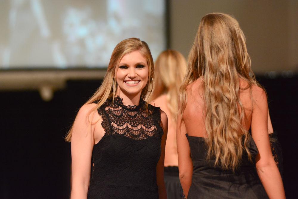 Audience choice winner in the COT Threads Senior Showcase, designer Meredith Griffith, walks behind her models on Dec. 3, 2016. Griffith&#8217;s collection was designed for the vibrant, contemporary woman discovering a balance between her newfound professional facets while keeping airs of her former young, rebellious nature.