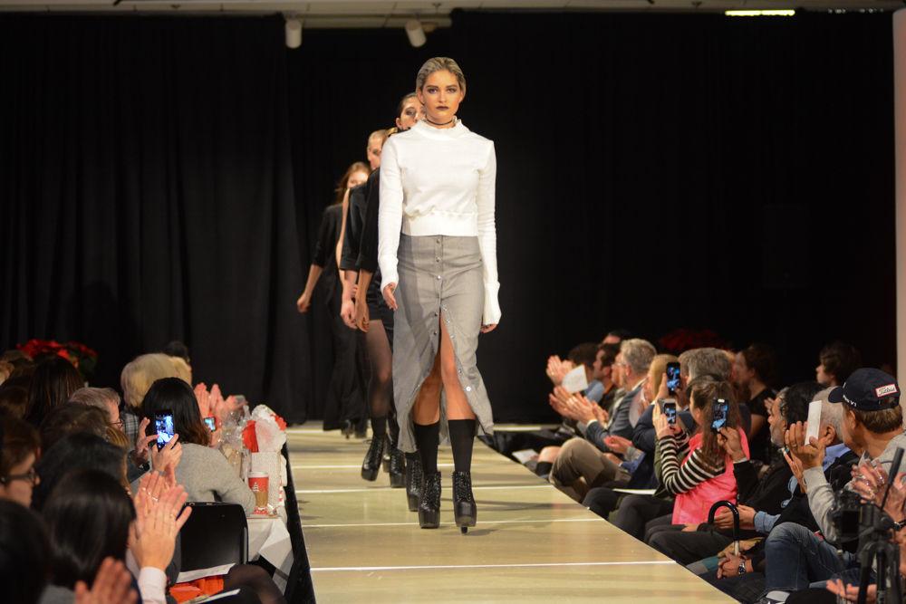 Models walk the College of Textile Threads Senior Showcase runway on Dec. 3, 2016 for the designer Sarah Evans. This collection, called "Resilient", was inspired by numerous female mentors and role models that have influenced Sarah throughout her life. They have each given her different values and traits, but ultimately have taught me how to become more resilient to the struggles that life may throw at you. It is through their drive, confidence, and ambition that has shaped Sarah into the individual that she is today and this collection is dedicated to them.