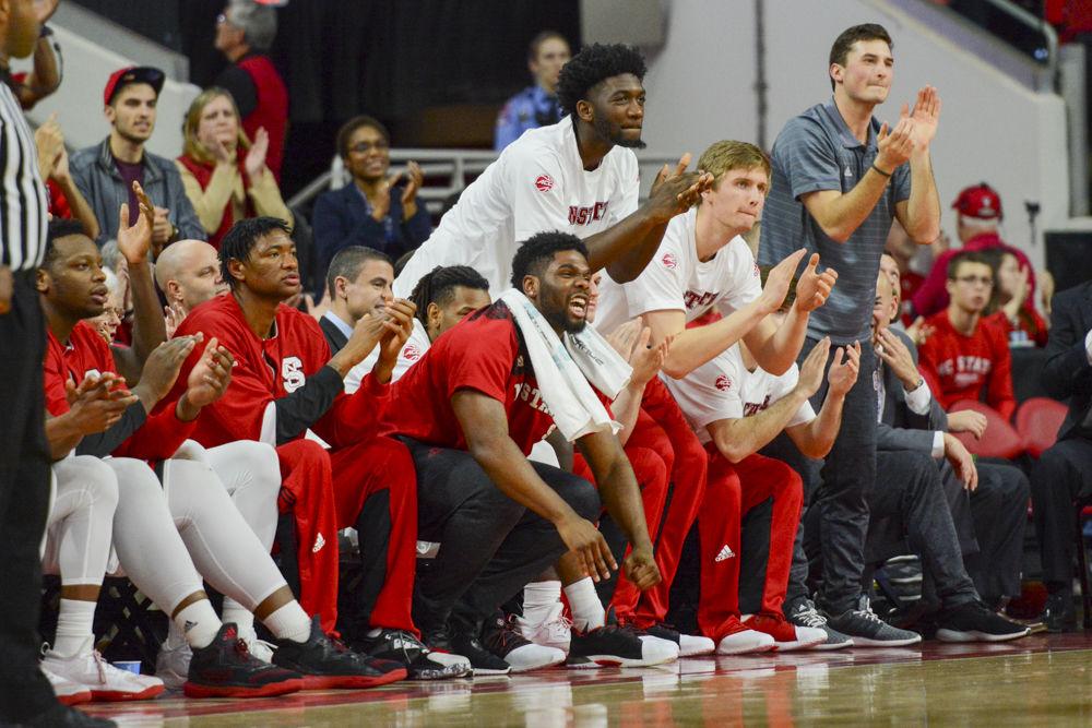 Members of NC State cheer on their teammates in the game versus Pittsburgh. The Wolfpack finished off their second ACC win with a final score of 79-74 on Tuesday in PNC Arena.