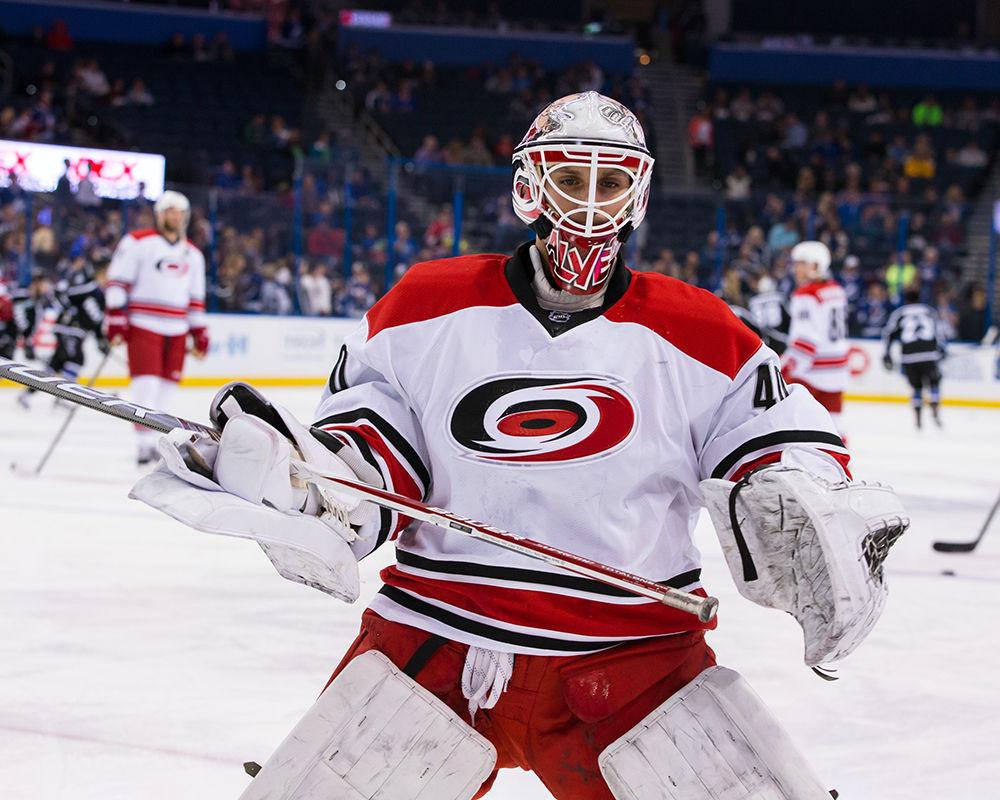 Hurricanes equipment manager Jorge Alves warms up before the game against the Lightning in Tampa on Dec. 31. Alves signed a professional tryout earlier that day after goalie Eddie Lack was scratched with an illness. He logged 7.6 seconds after coach Bill Peters substituted him in for Cam Ward.&#160;