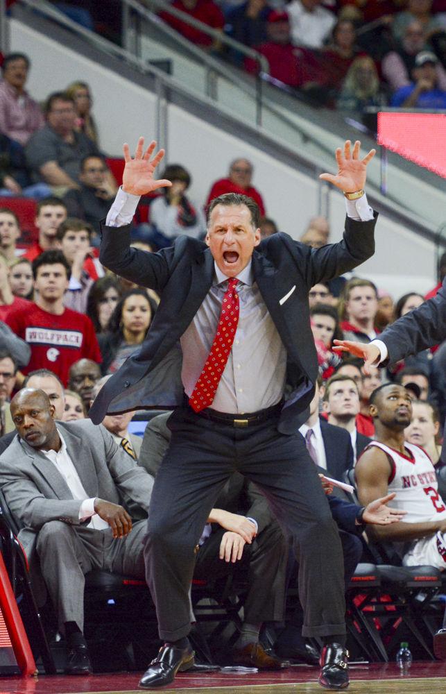 Head coach Mark Gottfried yells at the Men's Basketball team in their game versus Pitt. The Wolfpack had a close win over Pittsburgh with a final score of 79-74 in their game on Tuesday in PNC Arena.