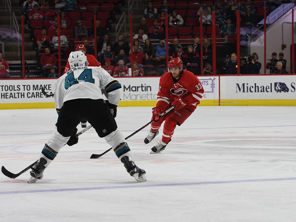 Hurricanes forward Derek Ryan maneuvers the puck through San Jose's defense during their game on Nov. 15. The Hurricanes defeated the Sharks, 1-0 in PNC Arena.&#160;