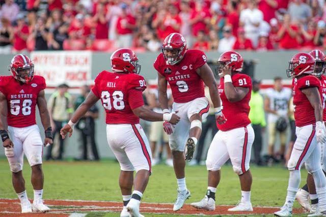 Junior defensive end Bradley Chubb celebrates with junior defensive tackle B.J. Hill after a big sack. The Wolfpack ended the Demon Deacons' hot streak with a 33-16 victory on Oct. 1 in Carter-Finley Stadium.