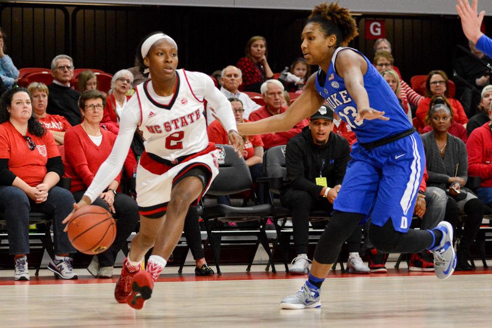 Redshirt freshman guard Kaila Ealey drives past the Duke defense during the ACC game between NC State and Duke in Reynold's Coliseum on Jan. 15. Ealey had one assist during her six minutes of play. The Wolfpack defeated the Blue Devils 55-52.