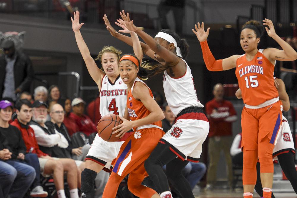 Senior guard Ashley Williams and junior forward Chelsea Nelson double team a Clemson player at half court during the Wolfpack's 65-53 win on Jan 22. Williams grabbed one steal and Nelson had 2 blocks in the win at Reynolds Coliseum.