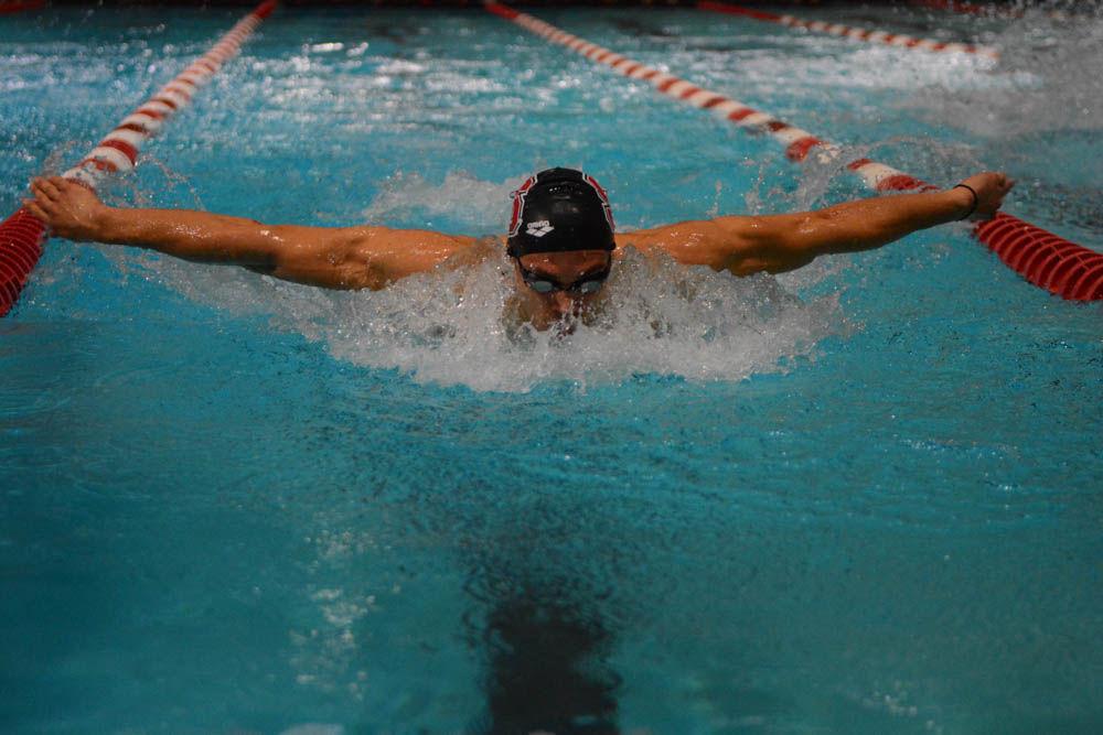 Junior Andreas Vazaios swims in in the 200 yard butterfly against UNC-Chapel Hill at the Willis R. Casey Aquatic Center on Jan. 27, 2017. Vazaios came in first in the 200 yard butterfly event with the time of 1:45.18 seconds. The Wolfpack settled the meet against the Tarheels with wins in 26 of 32 events.