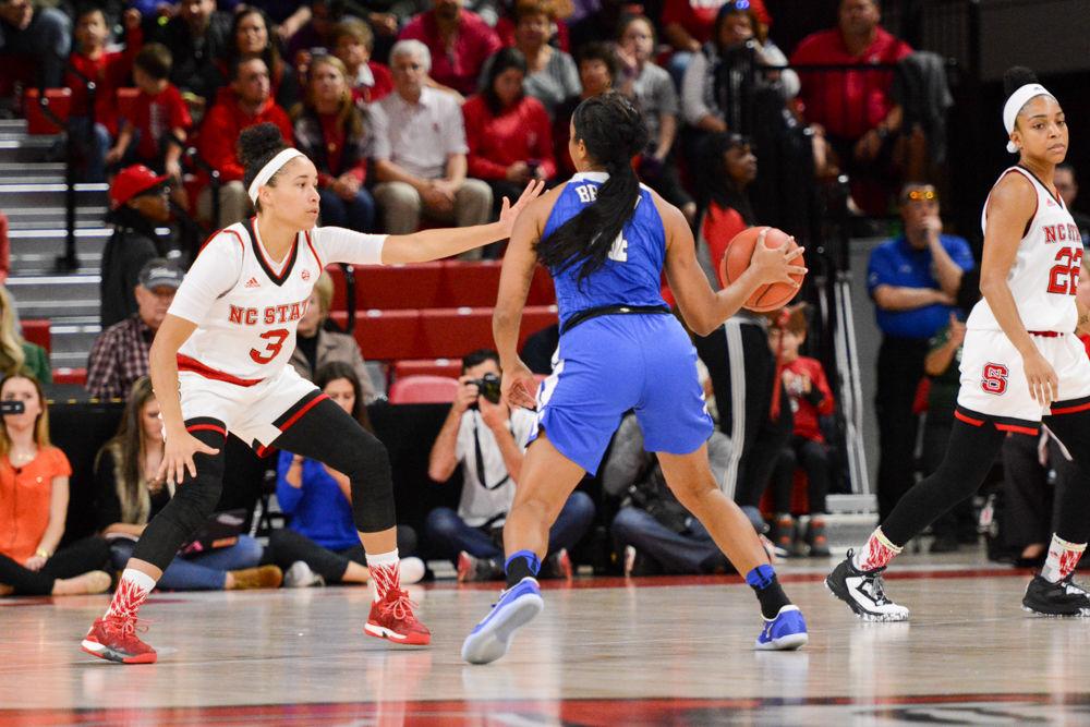 Senior guard Miah Spencer defenders against a Duke offender in Reynold's Coliseum on Jan. 15. The Wolfpack defeated the Blue Devils 55-52 in the ACC match-up.
