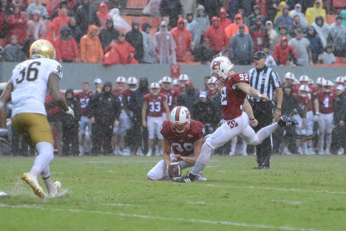 Sophomore kicker Kyle Bambard kicks a 38-yard field goal to put the first three points on the board for the Wolfpack on Oct. 8. Hurricane Matthew didn&#8217;t stop the Wolfpack from defeating Notre Dame 10-3 at Carter-Finley Stadium.