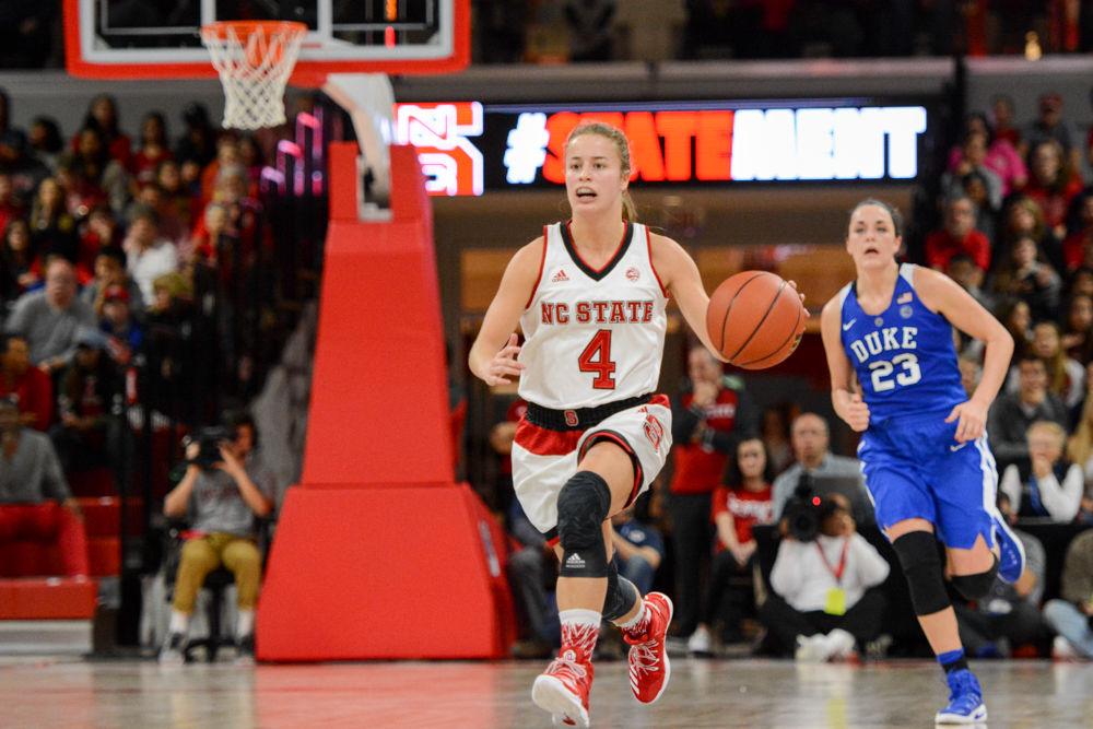 Senior guard Ashley Williams rushes down the court on a breakaway against Duke University in Reynold's Coliseum. Williams put up stats in nearly every category and went three-for-eight from behind the three-point line, helping the Wolfpack to a 55-52 victory against the Blue Devils on Jan. 15.