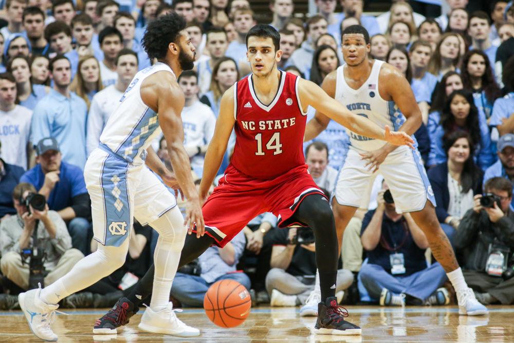 Freshman center Omer Yurtseven guards his man during the 107-56 loss to UNC-CH in the Dean Smith Center on Jan. 8.