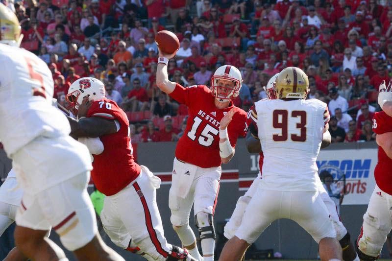 Sophomore quarterback Ryan Finley throws the ball across the field in Carter-Finley Stadium Saturday. Finley completed 23 passes out of 41 attempts for 307 yards along with two interceptions and two touchdowns. The Wolfpack lost to Boston College with the score of 21-14.