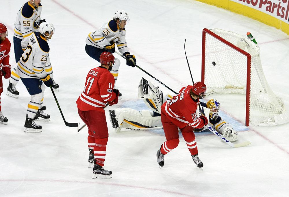 Hurricanes forward Brock McGinn nets his first goal of the game against the Sabres in PNC Arena on Friday. McGinn tallied two goals during the game, including the game-winner in Carolina's 5-2 victory over Buffalo.
