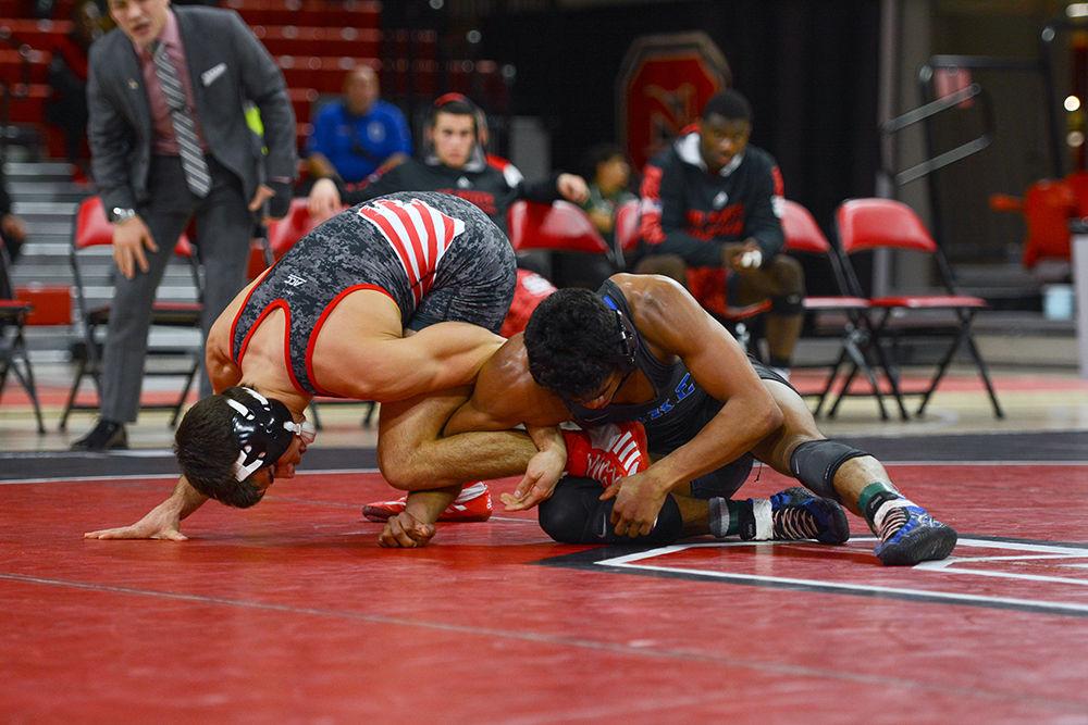 Redshirt senior Sam Speno attempts to reverse a hold. The NC State wrestling team beat Duke 34-6 in the ACC-opener at Reynolds Coliseum on Jan. 11.