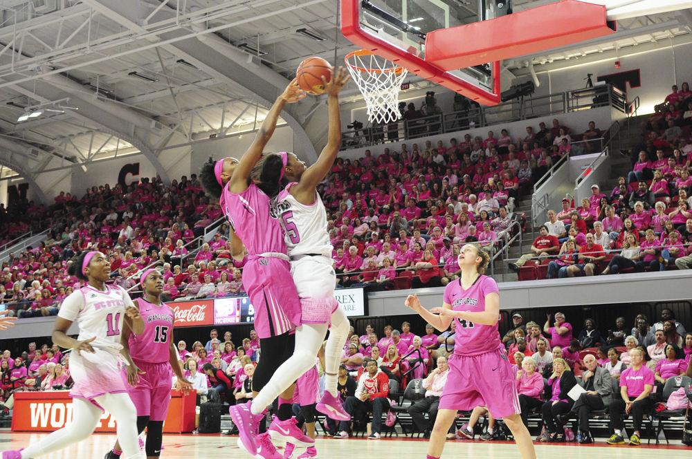 Junior forward Chelsea Nelson draws a foul in the annual Play4Kay game on Feb. 19. Nelson completed the contest with a double double tallying 18 points and 11 rebounds in their loss at Reynolds Coliseum.
