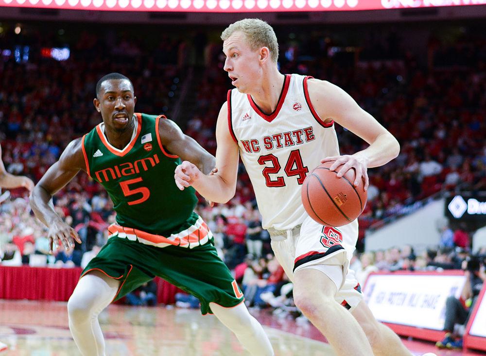 Sophomore guard Maverick Rowan dribbles inside for a layup. The NC State men&#8217;s basketball team lost to Miami 84-79 at PNC Arena on Feb. 4.