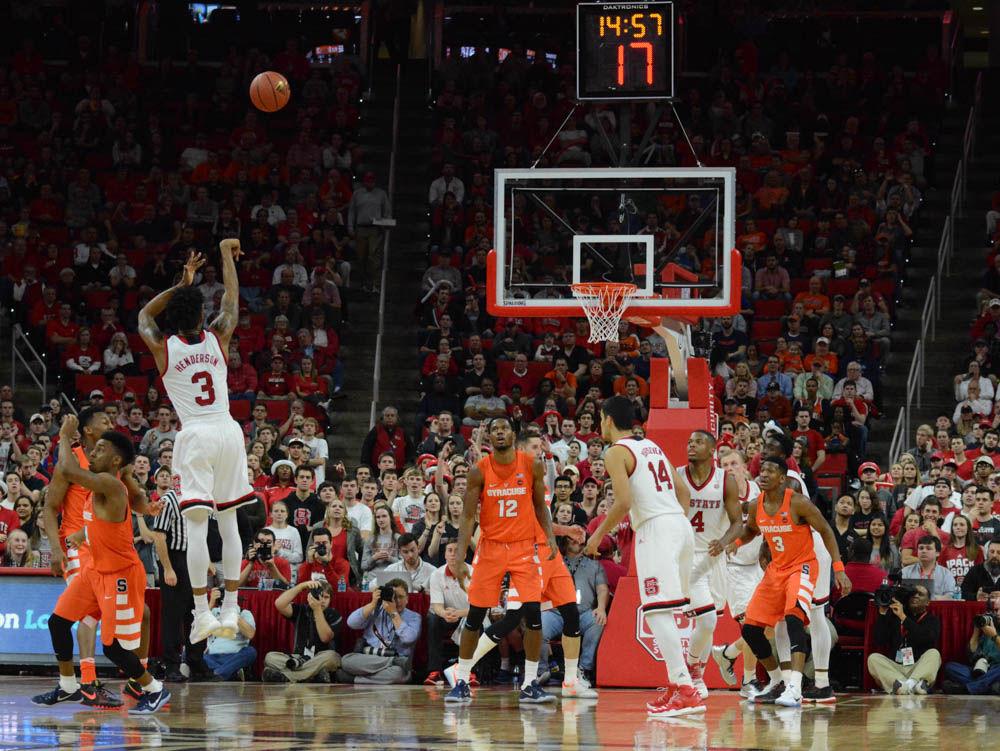 Redshirt Senior Terry Henderson goes for an open shot against Syracuse. The Men's Basketball had a tough loss in overtime with a final score of 100-93 in PNC Arena on Wednesday.