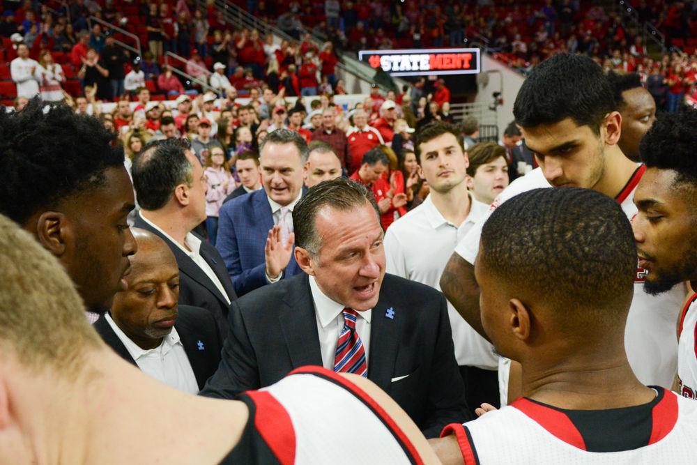 Head coach Mark Gottfried huddles with the players before the game. The Wolfpack lost to Miami 79-84 at PNC Arena on Feb. 4.