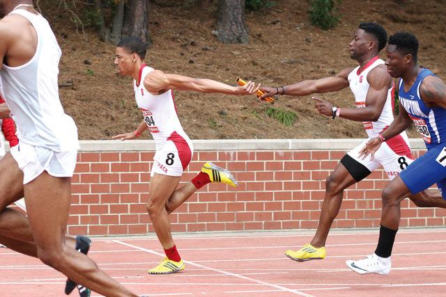Sophomore sprinter Quashawn Cunningham gets the baton handoff from sophomore sprinter Shannon Patterson in the 4-x-100 meter relay at the 2016 Raleigh Relays at Derr Track on March 26. The team took third place overall in the event with a final time of 40.38 seconds.