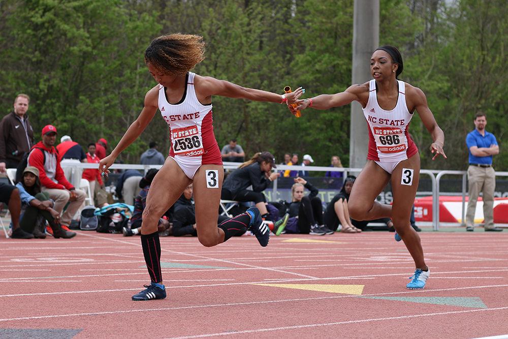 Then-sophomore sprinter Dejah Arnold hands the baton off to then-freshman sprinter Gabriele Cunningham at the first exchange in the 4x200m relay at the 2016 Raleigh Relays held at Derr Track on March 26. The relay team placed 11th overall in the event with a final time of 1:39.05.