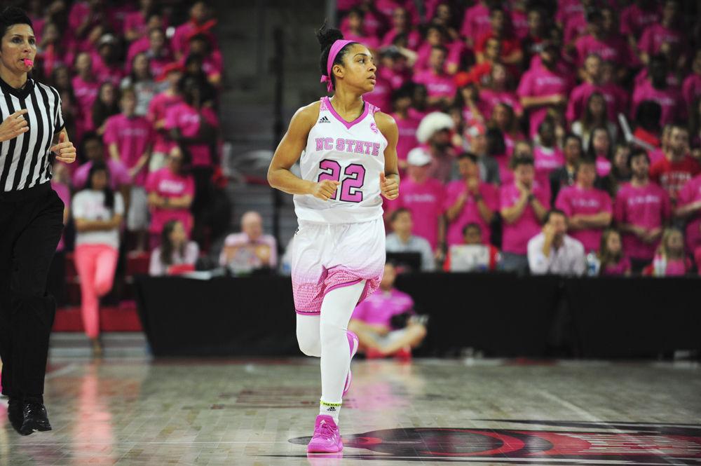Redshirt senior Dominique Wilson runs down the court in the annual Play4Kay game at Reynolds Coliseum. Wilson finished the game with 18 points and 2 assists in their loss to Wake Forest on Feb. 19.