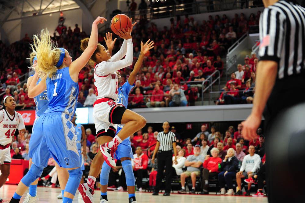 Freshman guard Lucky Rudd puts up a contested layup during the NC State win over Chapel Hill at Reynolds Colisuem. Rudd finished the game with three points in the Wolfpack's 80-60 point win on Feb. 23.