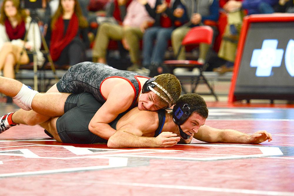 Freshman Daniel Bullard keeps a Duke player from scoring a reversal. The NC State wrestling team beat Duke 34-6 in the ACC opener at Reynolds Coliseum on Jan. 11.