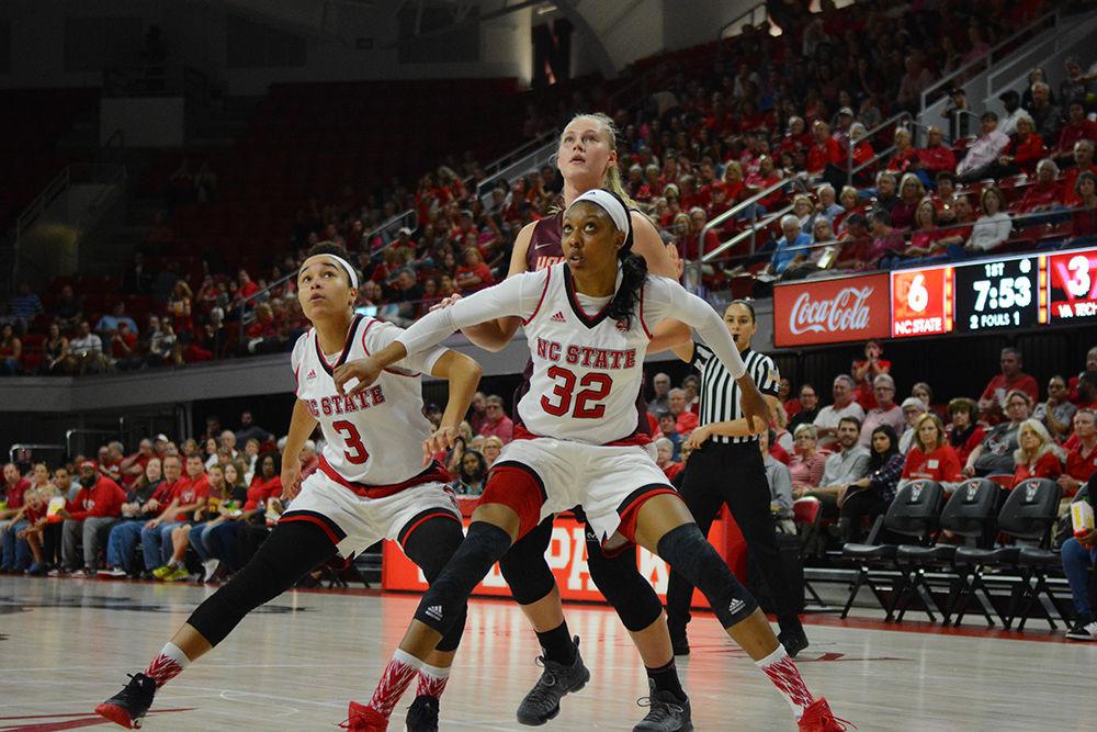 Senior guard Miah Spencer and junior center Akela Maize defend against Virginia Tech following a NC State free throw in Reynolds Coliseum on Feb. 12, 2017. The Wolfpack defeated the Hokies 85-71, improving to a 19-6 record, with a 9-3 record in the ACC.