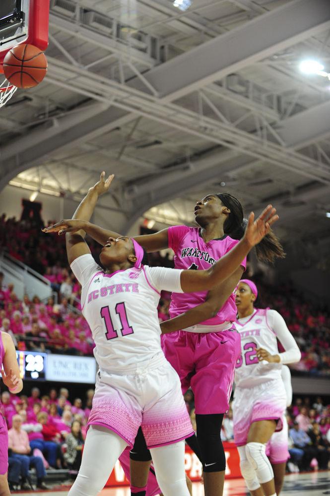 Senior forward Jennifer Mathurin gets fouled in the annual Play4Kay game on Feb.19 at the Reynolds Coliseum. Mathurin played for 35 minutes and finished with 8 points.