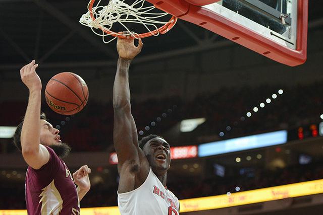 Sophomore Abdul-Malik Abu dunks during the FSU game in PNC Arena. The Wolfpack forward scored 21 points in the losing effort. The Wolfpack lost the game to the Seminoles by a score of 85-78 on Wednesday, January 13, 2015.