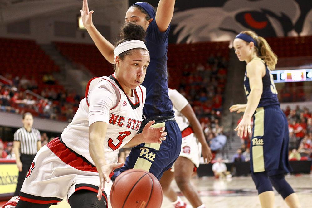 Senior guard Miah Spencer drives the ball down the baseline during the Wolfpack's 55-42 win against Pittsburgh on Jan 26. Spencer posted seven points and four assists in the win at Reynolds Coliseum.