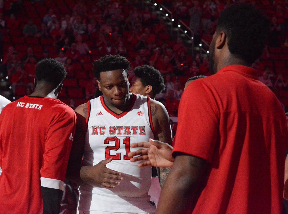 Senior BeeJay Anya walks in after getting announced in the starting lineup for the game versus Virginia. Anya was recognized with his fellow senior teammates Terry Henderson and Chris Brickhouse in their last home game of the 2016-2017 season.