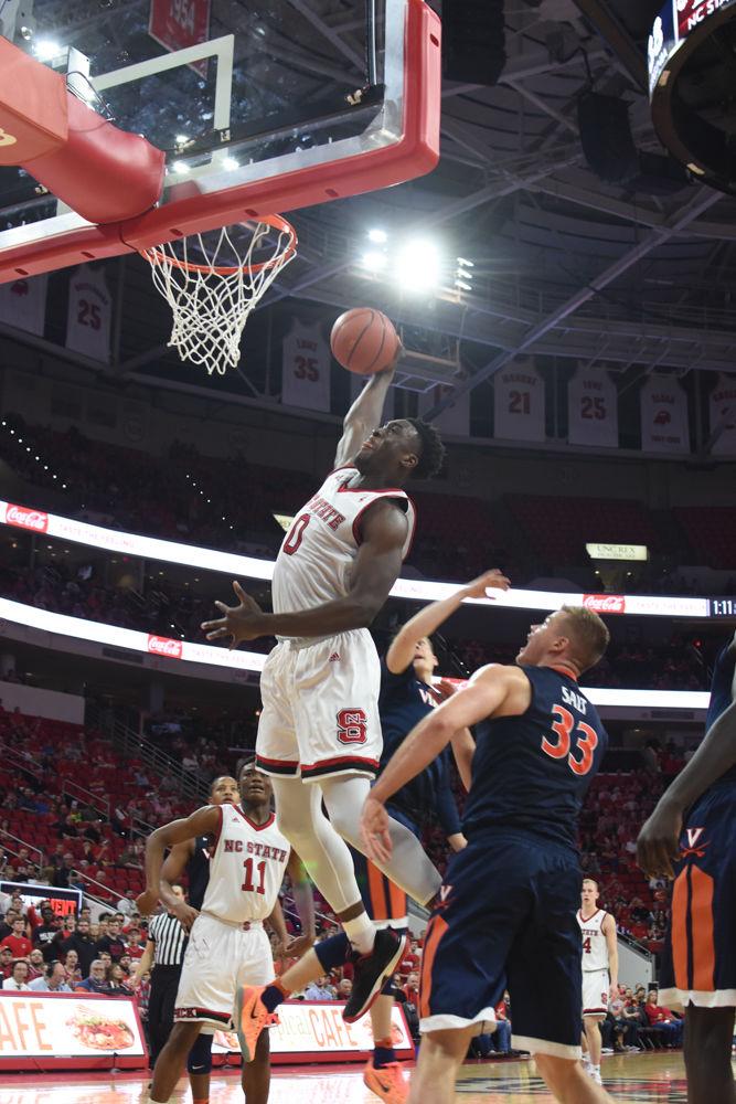 Abdul-Malik Abu forced a fowl and dunked on Virginia in PNC Arena on Feb. 25. Abu had 12 points against Virginia, but the Pack was defeated 70-55.