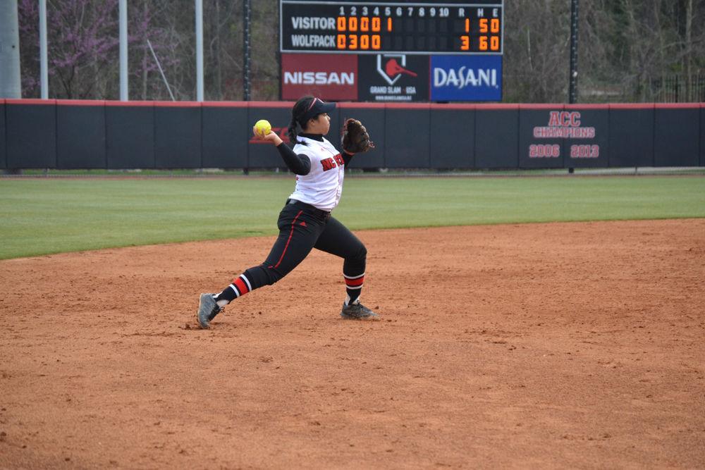 Alyssa Compton fields a ball and throws it to first base during the game against the University of Virginia on Friday, Mar. 17, 2017 in Dail Stadium. Compton has made 126 catches this season.