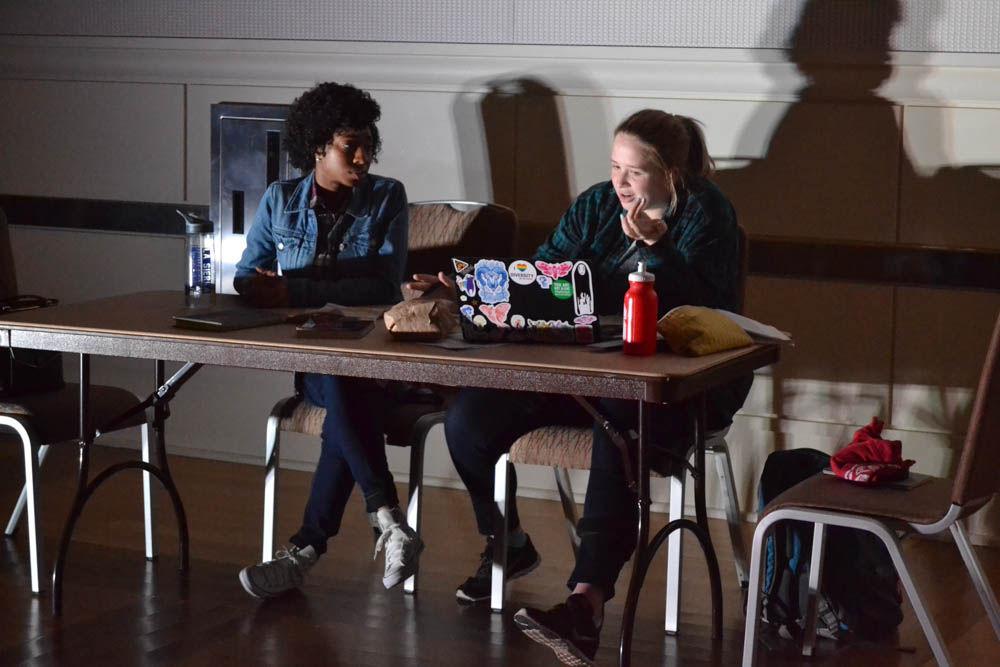 Two students act out a scene about stress, therapy and medication during the Tunnel of Oppression in the State Ballroom on Wednesday. Both students volunteered their time to help out with the annual event.