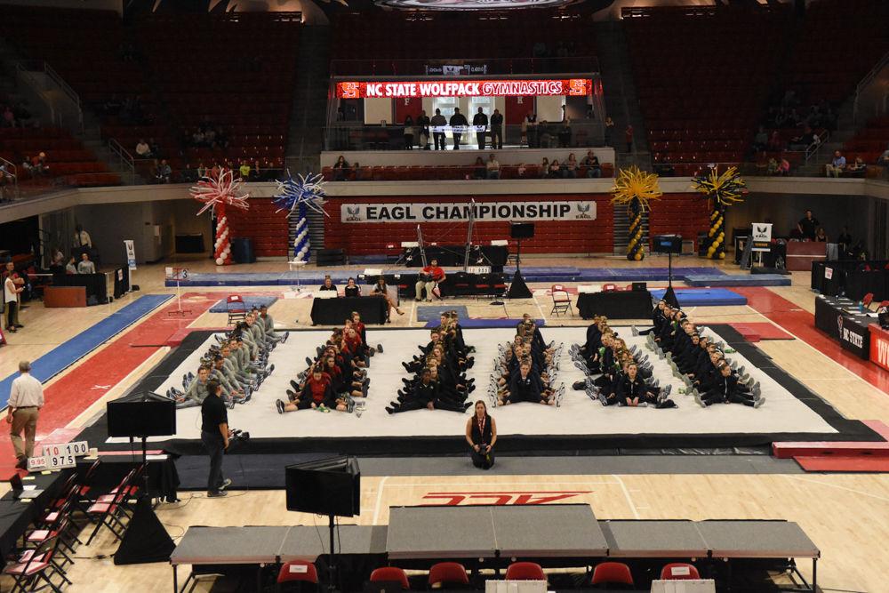All six teams sit for the award ceremony during the 2017 EAGL gymnastics championship in Reynolds Coliseum on March 18. The Wolfpack came in third place behind George Washington university and the University of New Hampshire.