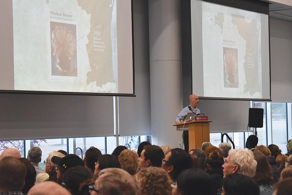 Author and scientist, Dr. Rob Dunn, discusses "Never Out of Season," a book on crop biology, during the book's launch event at the James B. Hunt Jr. Library on Thursday, March 16, 2017. In concluding, Dr. Dunn challenged his audience to grow squash and other plants in order to help save their diverse varieties and study their biology.