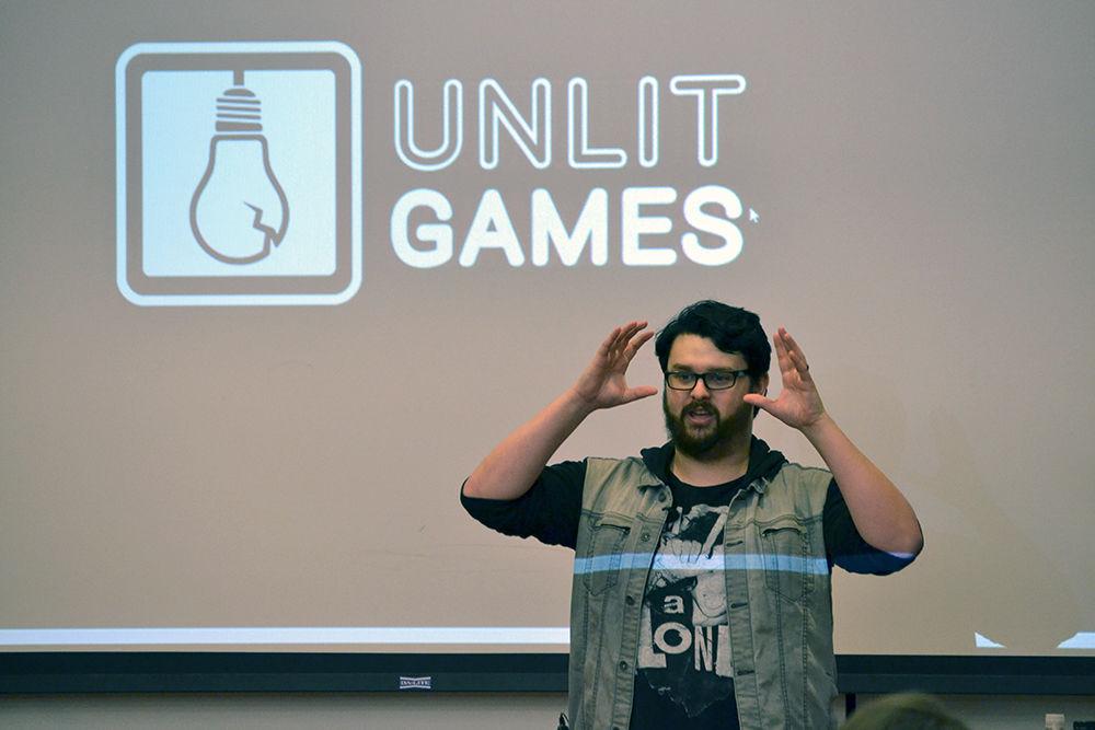 Michael Lepard, the owner and founder of Unlit Games, describes how anyone can easily get started in programing virtual reality games in D.H. Hill on Wednesday. Lepard started VR programming four years ago with the platform Unity as well as online tutorials and is now aiming to make one of the first VRMMORPGs with his company.