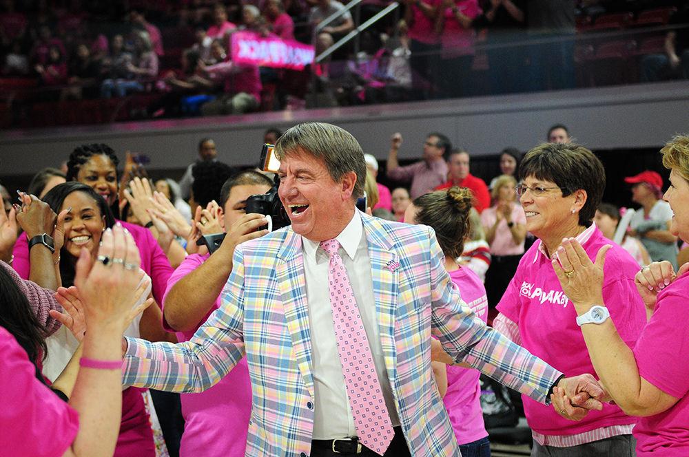 Head coach Wes Moore is greeted by alumni as he walks onto the court for the annual Play4Kay game on Feb. 19. NC State lost to Wake Forest 89-77 at Reynolds Coliseum.