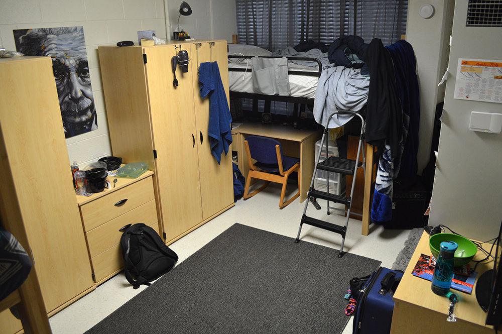 A C/D style room in Lee Residence Hall is decorated with an Einstein poster.&#160;