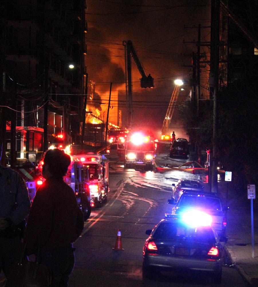 A massive fire broke out in an unfinished apartment building in downtown Raleigh on Thursday night around 10:30. The fire, which happened near Harrington Street, spread to the surrounding vegetation and rooftops of nearby buildings.