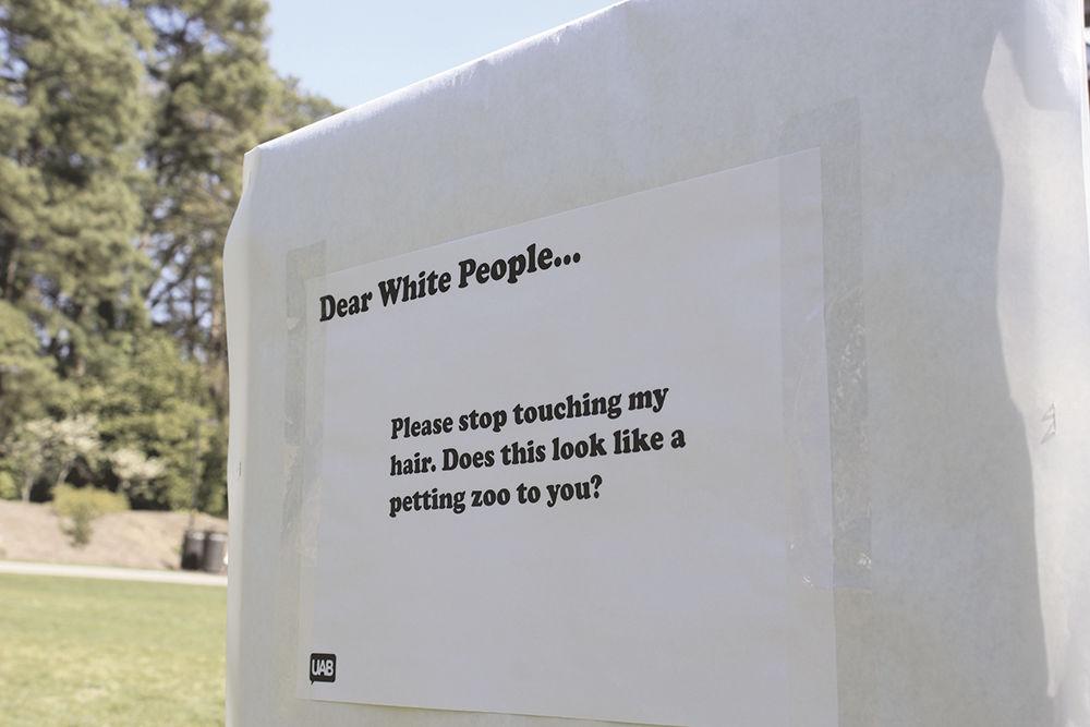 A sign from the "Dear White People" demonstration happening at Stafford Commons on Mar. 23. The event was sponsored by UAB Films and was intended to spark discussion about common racial stereotypes.