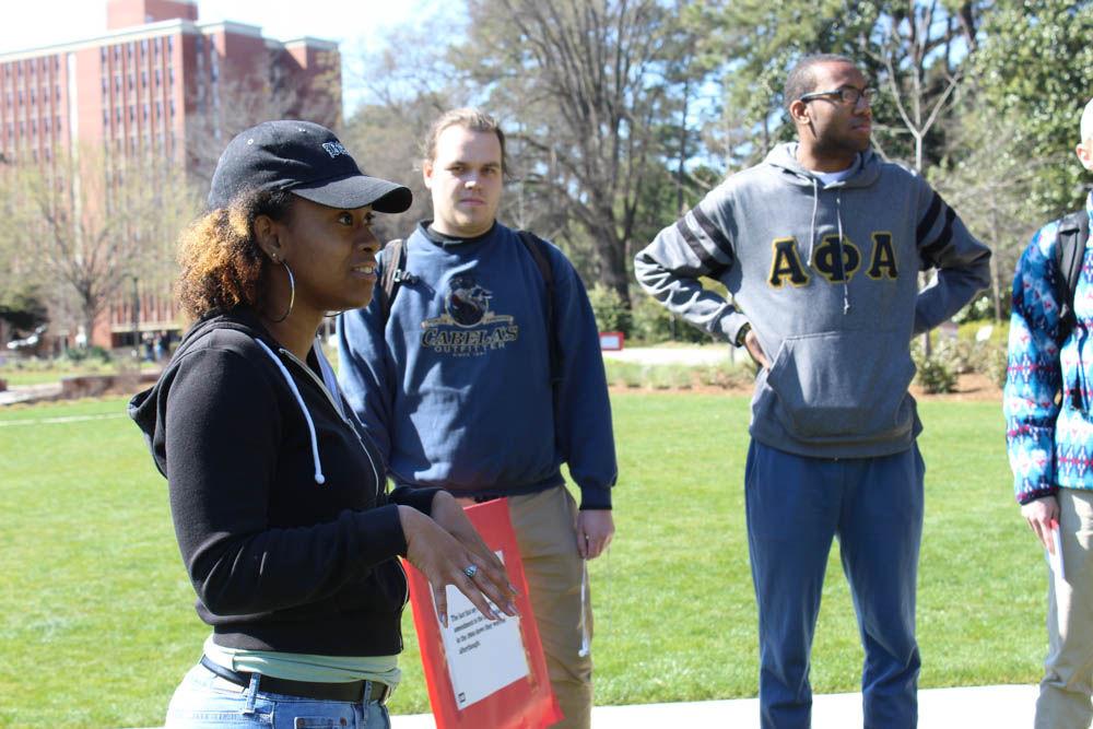 Achaia Dent, a sophomore studying psychology speaks to a group of students about her opinions on the "Dear White People" demonstration on Stafford Commons on Thursday. The event was sponsored by UAB Films and was intended to spark discussion about common racial stereotypes. "I'm really excited to be engaging in these conversations and breaking these barriers," Dent said. "I feel like this is something that really needs to happen on this campus."