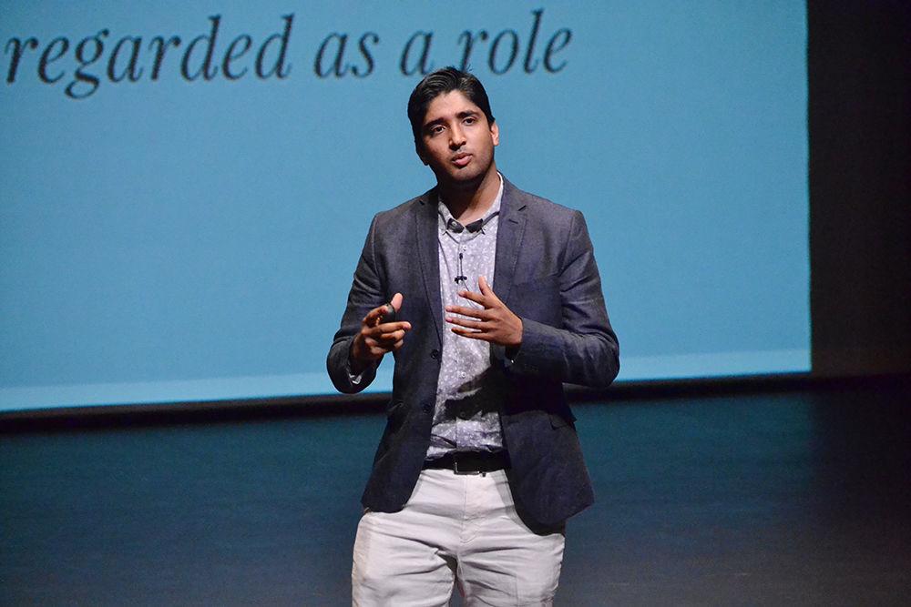 Waleed Ahmed, a junior majoring in international studies, talks about chasing after dreams instead of getting stuck on back-up plans during the TUFFtalks in Stewart Theatre Monday. Ahmed argued that people are wasting too much time stuck on the safe path of life to realize the happiness of living out dreams.