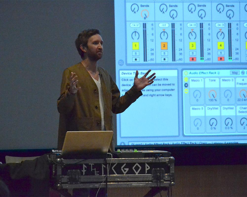 Nicholas Sanborn, the producer of the indie pop duo Sylvan Esso, shows the audience his music-making method with Ableton Live in Hunt Library on Wednesday. Sanborn mixes snippets of different sounds and then modifies them through various programs to match the music to what he envisions.