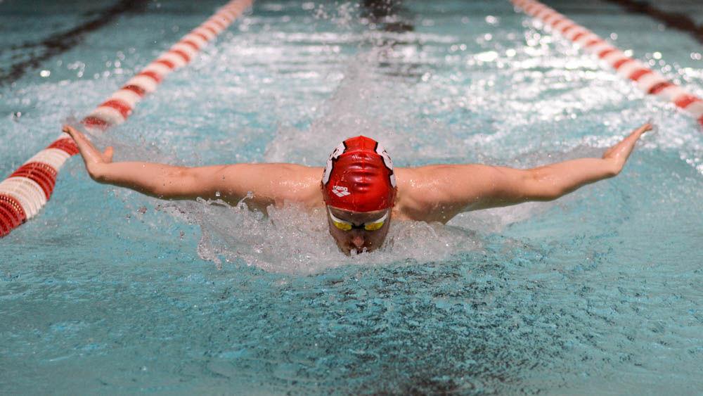 Senior Joe Bonk swims the 50 yard freestyle. The NC State men's and women's swimming teams beat Carolina in 26 of 32 events at Willis R. Casey Aquatic Center on Jan. 27.