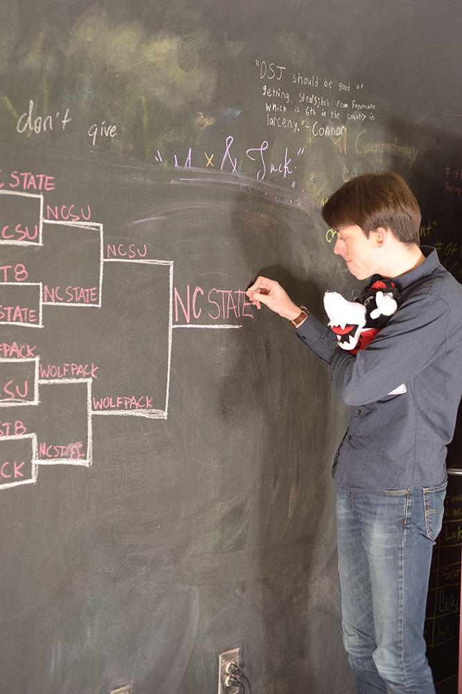 Gark Mottfried, a recently expelled student who studied everything but defense, fills out his NCAA bracket. Mottfried spent hours picking out teams and later said, "This bracket is fire, and I know a lot about fire."