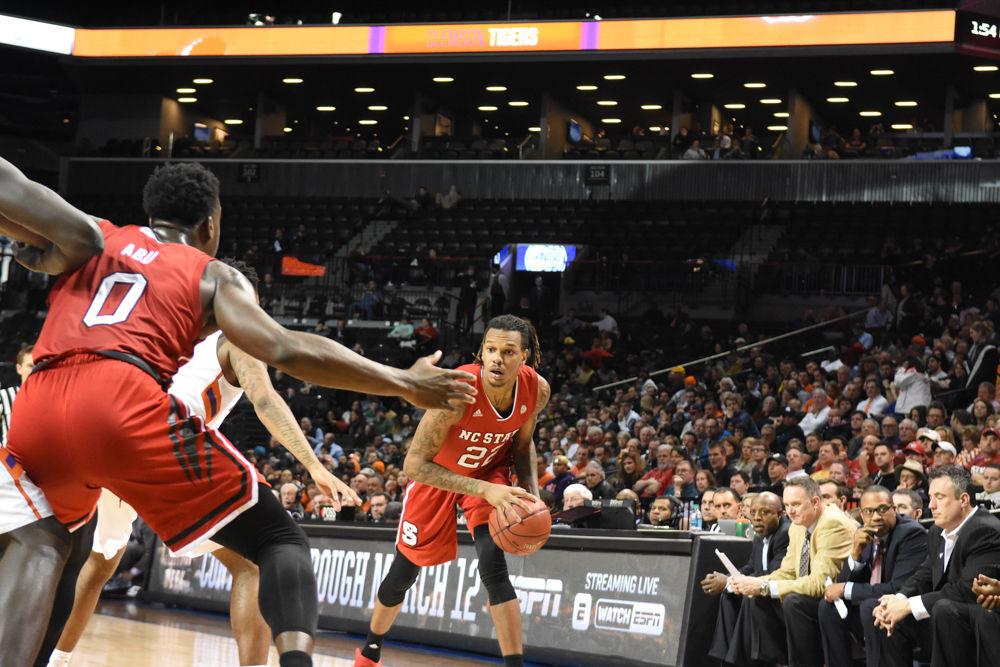 Shaun Kirk looks for an open pass during the first round of the ACC Tournament on March 7 in Brooklyn, New York in Barclays Center. Henderson scored 10 points, but the Pack was defeated by Clemson, 75-61.